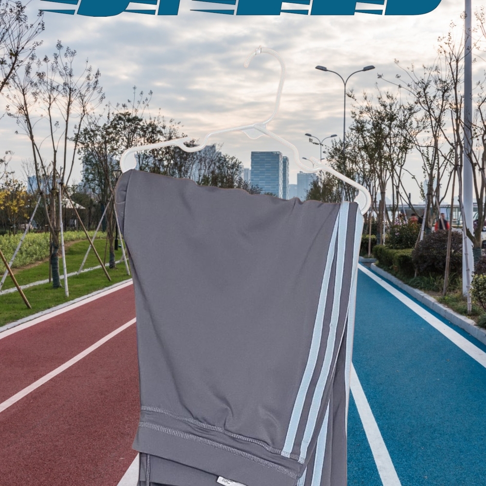 Womens Adidas Originals Gray Capris with Light Blue Accents